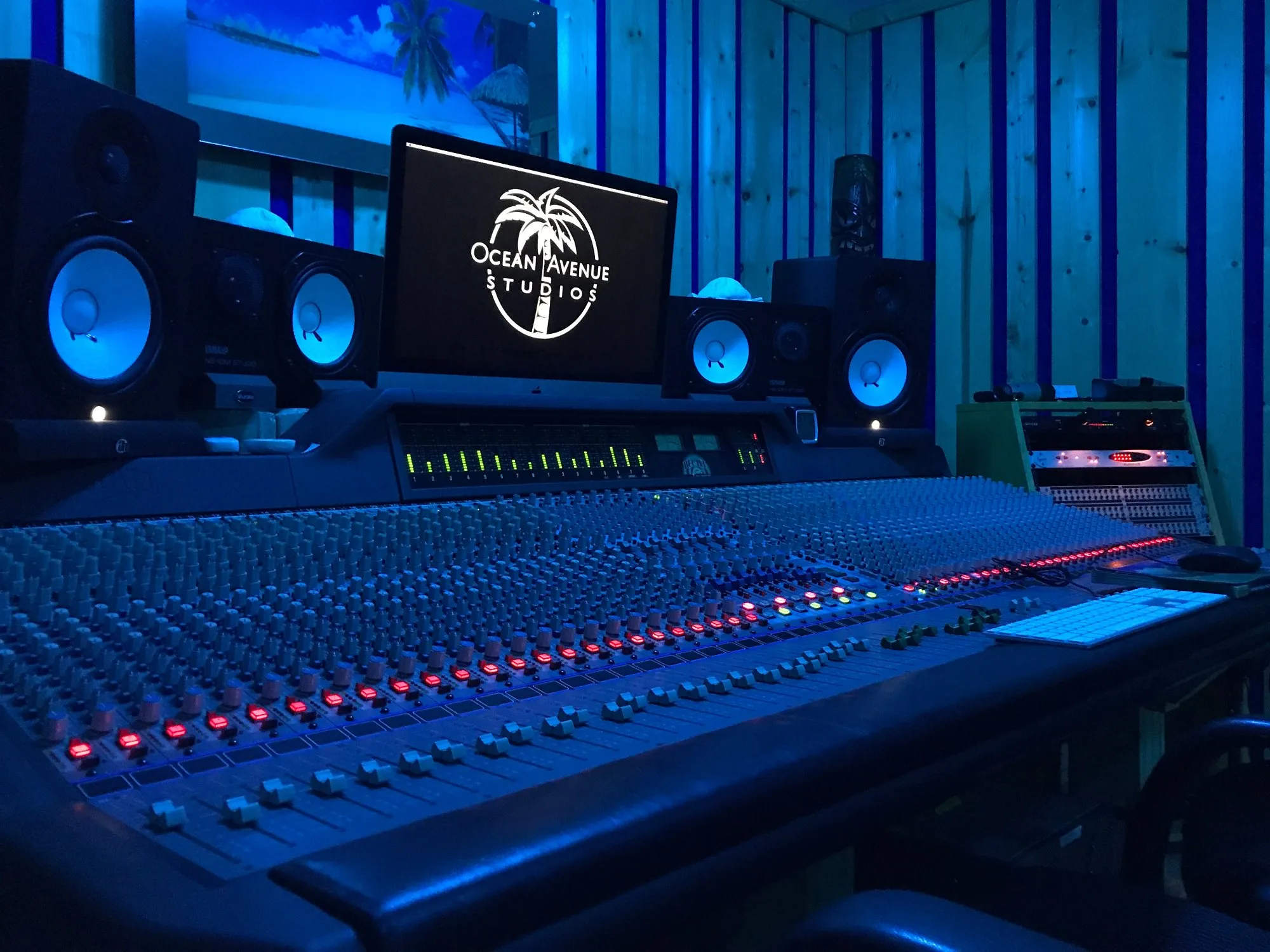 Ocean Avenue Studios control room with blue-lit mixing console